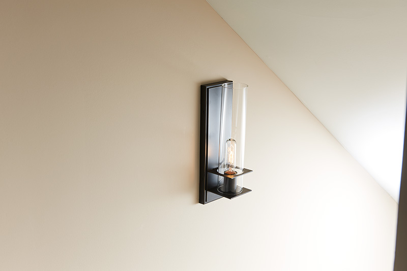 Savoy House Hartford - Wall sconce sizing by a staircase - The Complete Wall Sconce Sizing Guide - LightsOnline Blog