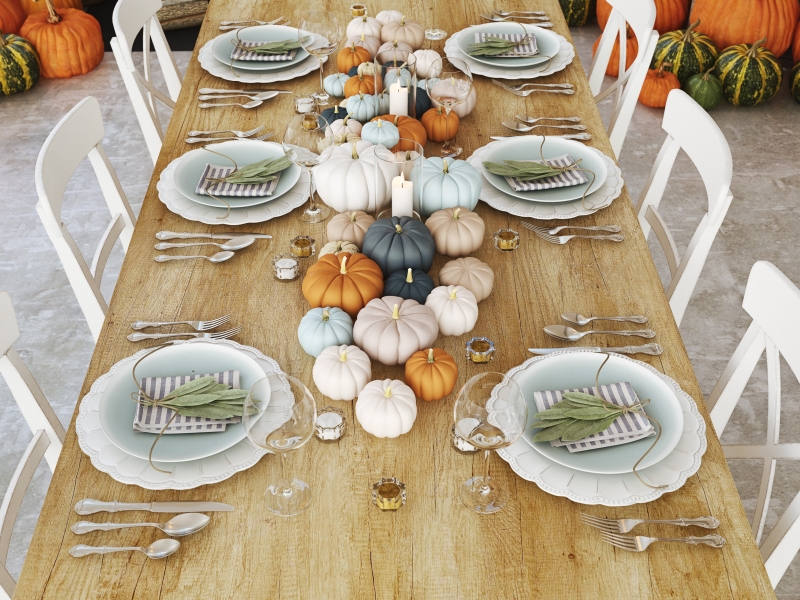 A colorful fall-themed dining room with pumpkins in many different colors - LightsOnline Blog